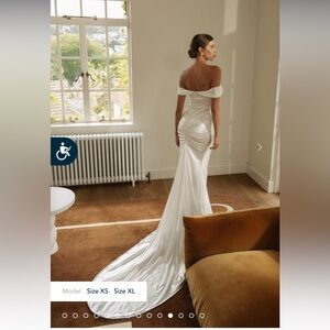 Never worn in packaging- Grace loves lace Cupid wedding dress size small